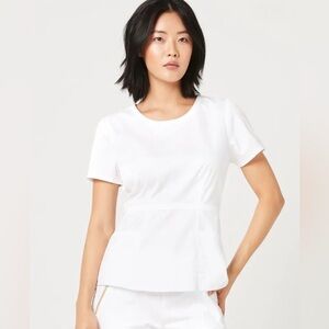 NWT JAANUU White Peplum Scrub Top S